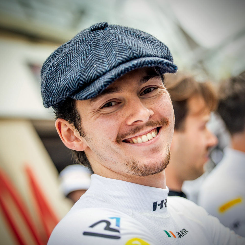Reece Barr wearing Cordings Blue Pickering Donegal Cap at a race track